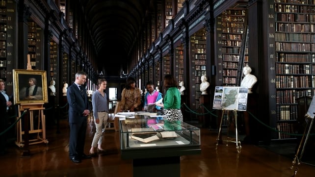 The First Lady was shown the Obama Family archives in the Long Hall Library