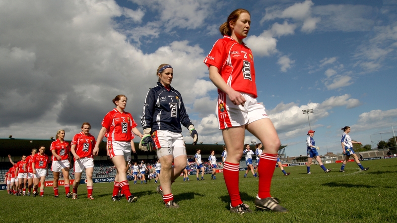 Rena Buckley leading the Cork footballers out last year