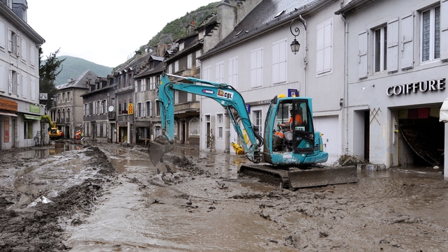 Work on cleaning up the town got under way as soon as the waters receded