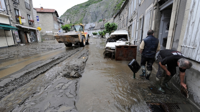 The clean-up starts in Saint-Beat after the village was submerged by flash floods