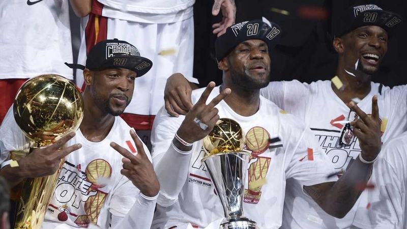 Dwyane Wade (L), LeBron James (C) and Chris Bosh (R) of the Miami Heat