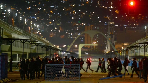 Anti riot police officers patrol the landmark Sambadrome in Rio