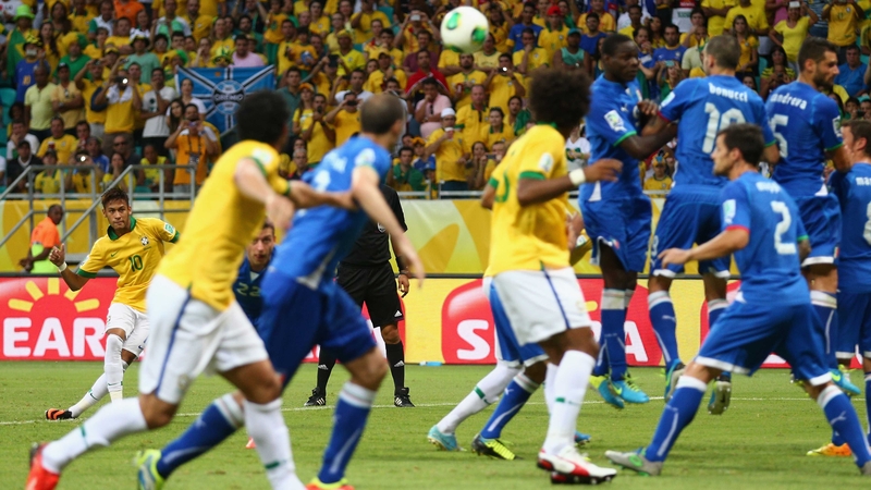 Neymar curls the ball to the back of the net from a free-kick