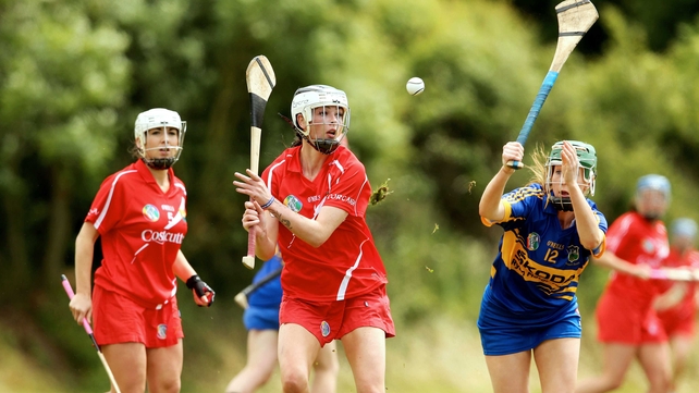 Tipperary's Brid Quinn attempts to block down Aisling Thompson of Cork during their Senior Camogie Championship tie