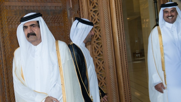 Qatari Emir Sheikh Hamad bin Khalifa al-Thani (left) has passed on power to his son Sheikh Tamim bin Hamad bin Khalifa al-Thani (right)