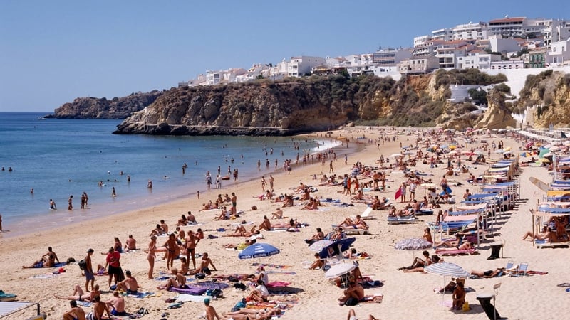 A used car salesman who ran into his bosses on a sun holiday Portugal's Algarve coast has won €12,500 for unfair dismissal after being fired on the spot when he got home