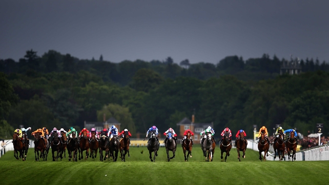 The Wokingham field sprint for home under a gloomy sky at Royal Ascot