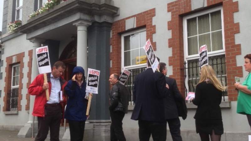 Workers have taken part in a one-day stoppage outside Kells Credit Union