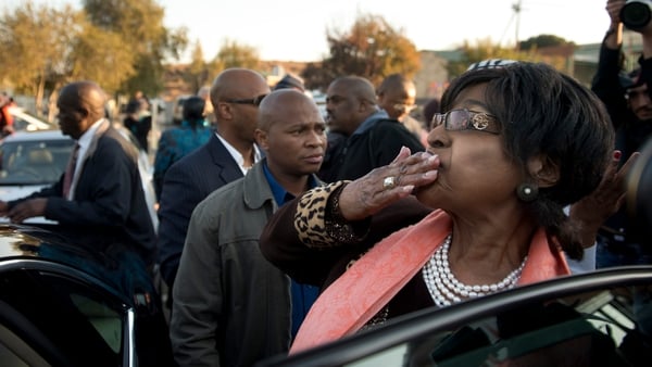 Winnie Madikizela-Mandela spoke to reporters outside Mr Mandela's former home in Soweto