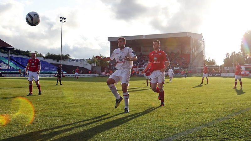 Seamus Conneely of Sligo with Darren Tinnelly of Shelbourne