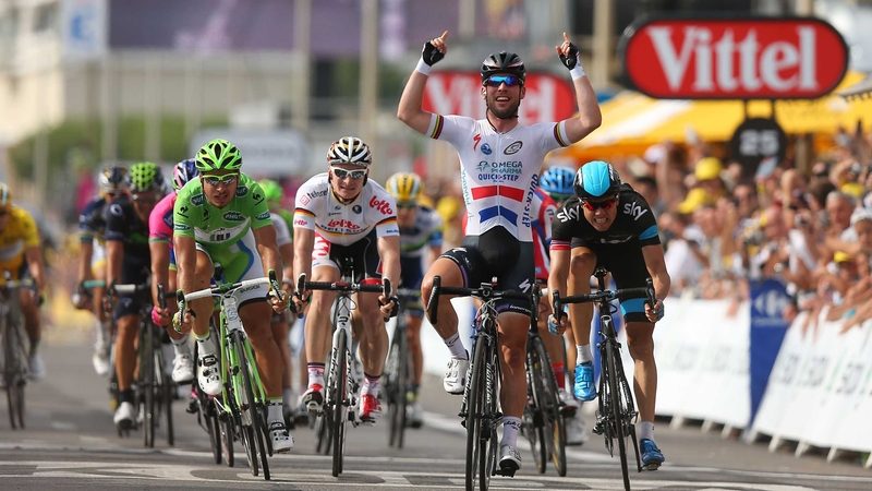 Mark Cavendish celebrates winning a Tour de France stage for the 25th time