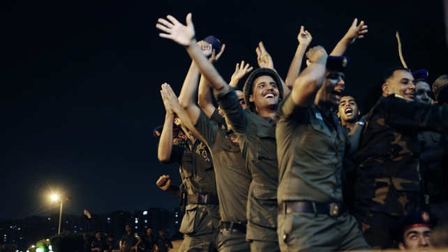 Officers of the Egyptian Republican Guard at the gates of the Republican Guard headquarters