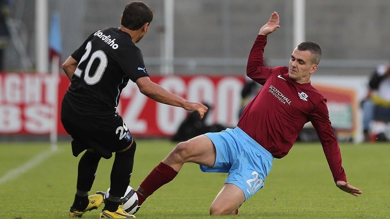 Michael Daly tackles Ricardo Ferreira da Silva