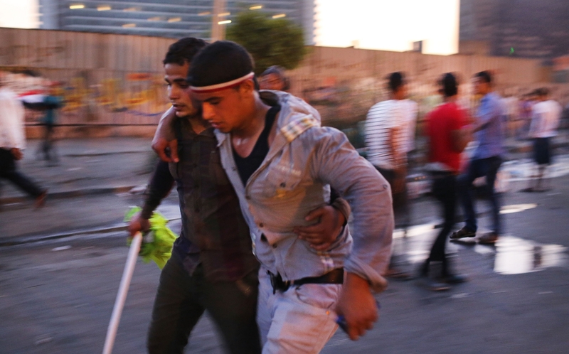 Witnesses reported gunfire and stone-throwing among the crowds