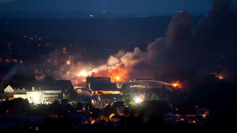 Four of the cars, which each carried 30,000 gallons of crude oil, caught fire