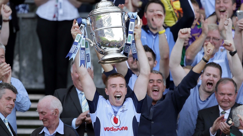 Dublin captain John McCaffrey lifts the Bob O'Keeffe Cup in 2013