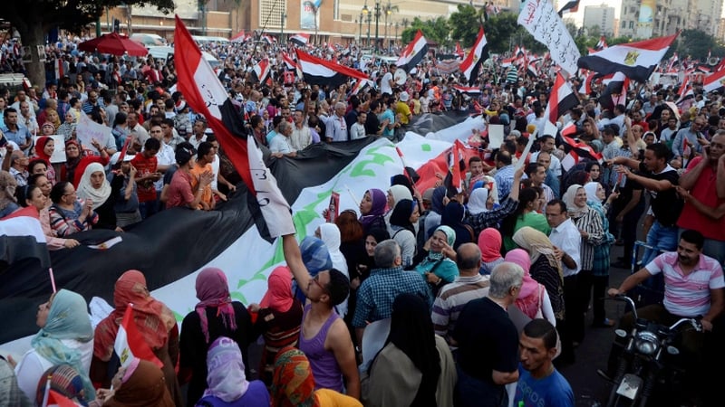 People protest in Alexandria, where 14 people died on Friday, clashes broke out again, but there were no immediate reports of casualties