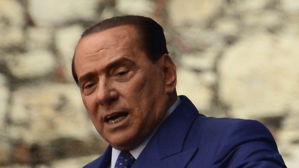 Silvio Berlusconi said Mr Alfano's decision to form a new bloc had 'caused him a lot of pain' prompting members of his audience to yell 'traitors'