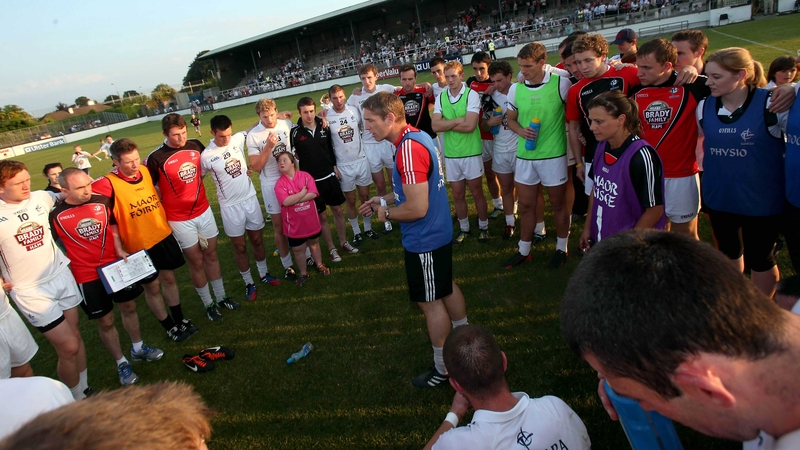 Kieran McGeeney address his players after the game