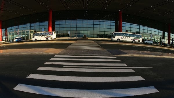 A man detonated a package of black gunpowder outside Beijing's Terminal three international arrivals exit