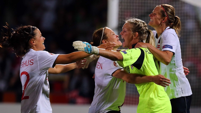 Norway goalkeeper Ingrid Hjelmseth celebrates with her team-mates after winning their UEFA Women's Championship semi-final