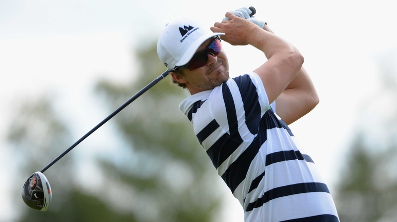 Rikard Karlberg holds a two-shot lead