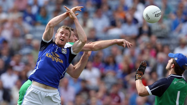 Paul Gerarghty of London gets in behind Rory Dunne of Cavan to score the first goal of the game