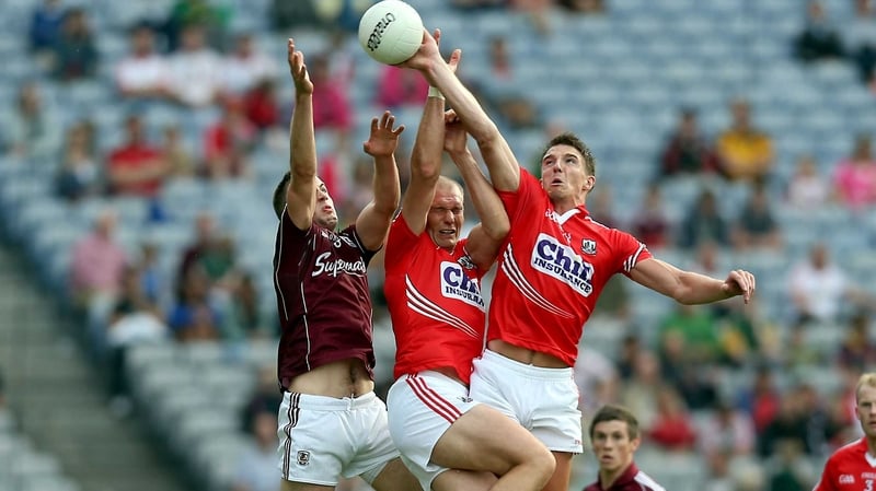 Alan O'Connor and Aidan Walsh of Cork with Paul Conroy of Galway