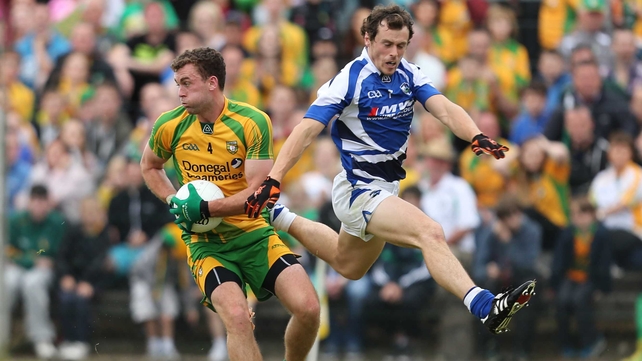 Donegal's Eamonn McGee and Padraig McMahon of Laois battle in their round four qualifier tie