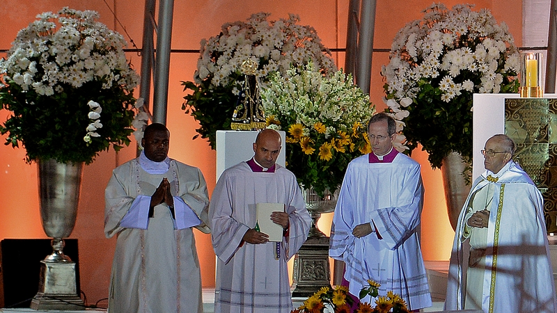 Pope Francis (far right) leads a prayer vigil at Copacabana beach