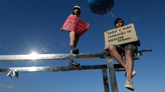 Protesters scaled a frame to help spread their message