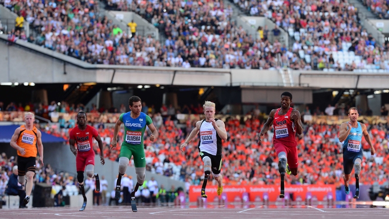 Alan Oliveira of Brazil (third from left) on his way to victory in the T43 100m