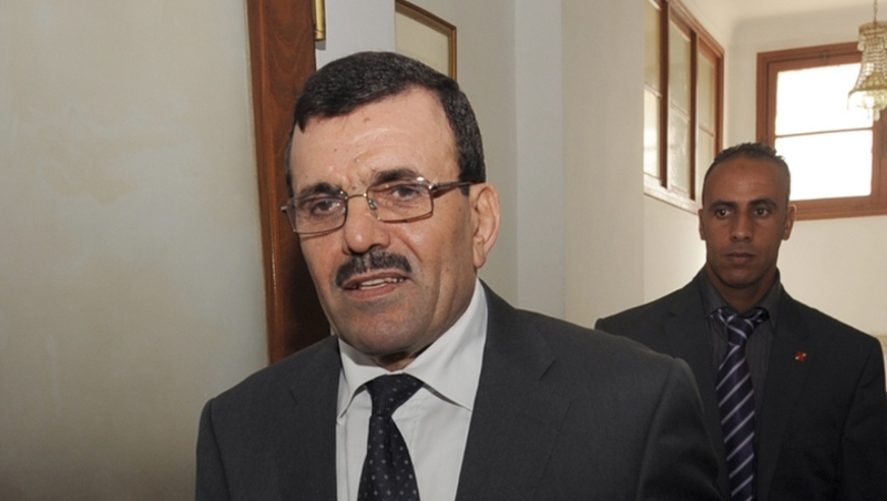 Tunisia's Prime Minister Ali Larayedh announced that the Islamist-led transitional government wil continue working despite mounting efforts to dissolve it