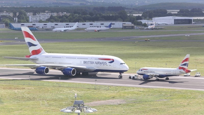 British Airways' new Airbus A380 next to the airline's smallest craft, the A318