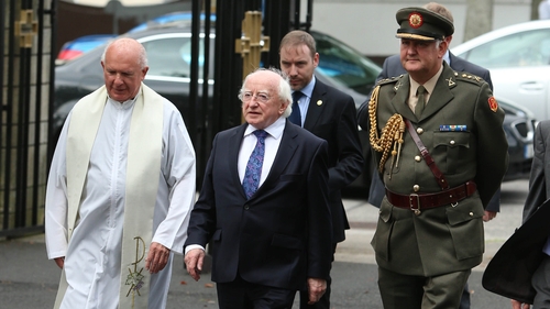 President Michael D Higgins joined the crowds of family and friends at the mass