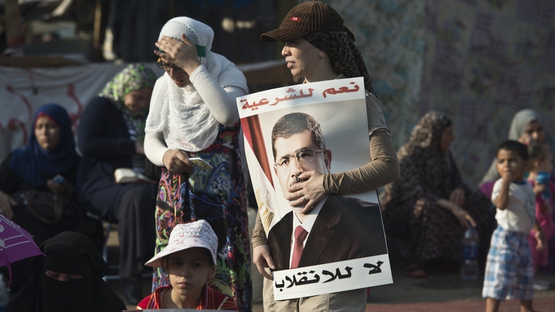 Supporters of Mohammed Mursi attend a rally in Cairo