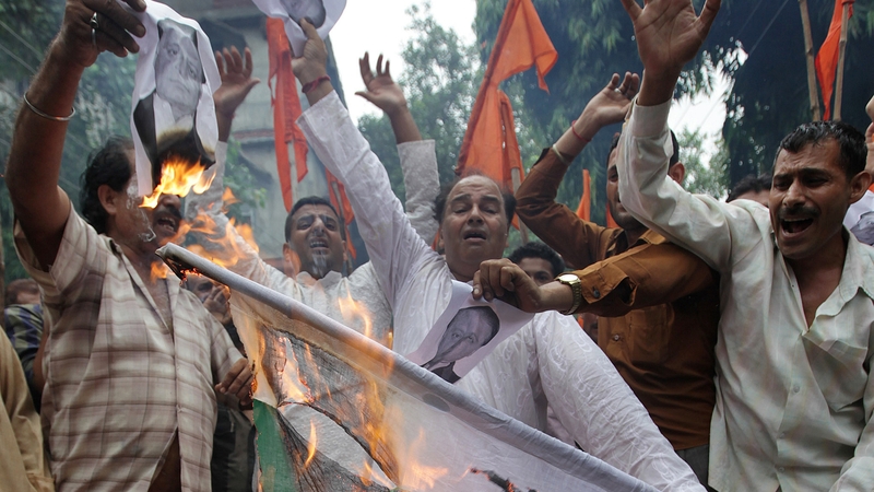 Indian activists protest following the deaths of five soldiers in Kashmir