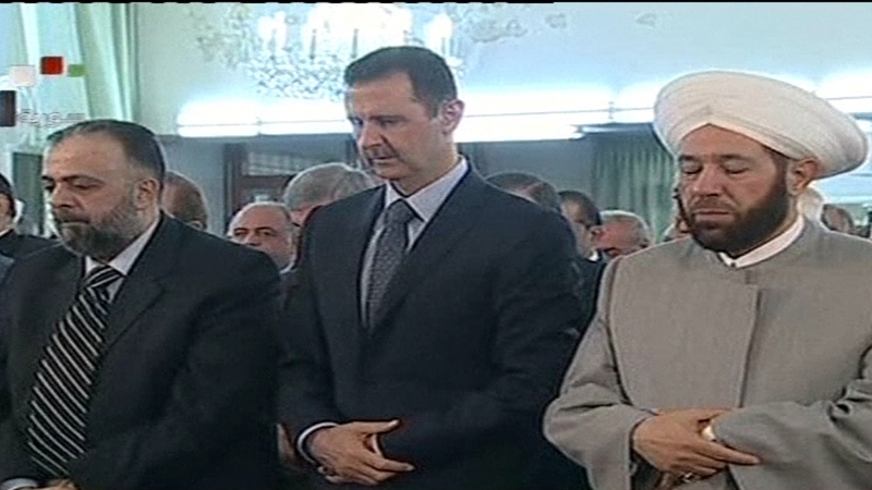 Rebels said they had fired rockets that hit Bashar al-Assad's motorcade