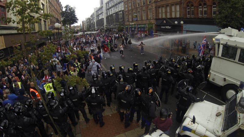 56 police officers and two civilians were hurt in violent protests in Belfast on Friday