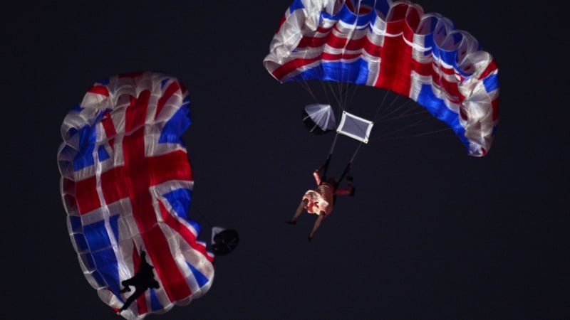 Mark Sutton (L) parachuted into the Olympic Stadium with Gary Connery as the 'queen' alongside him