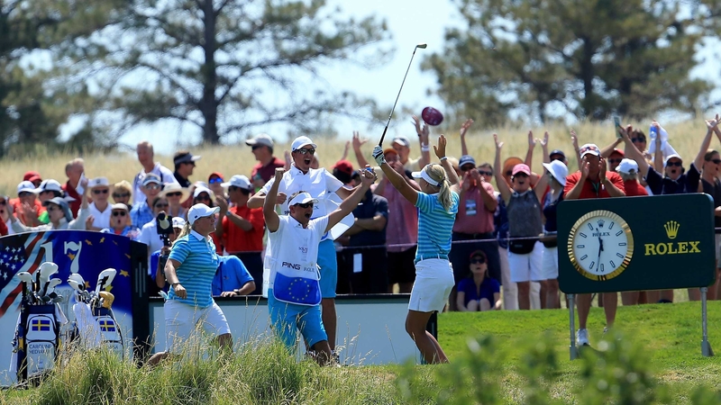 Anna Nordqvist celebrates her historic feat on the 17th hole at Colorado Golf Club