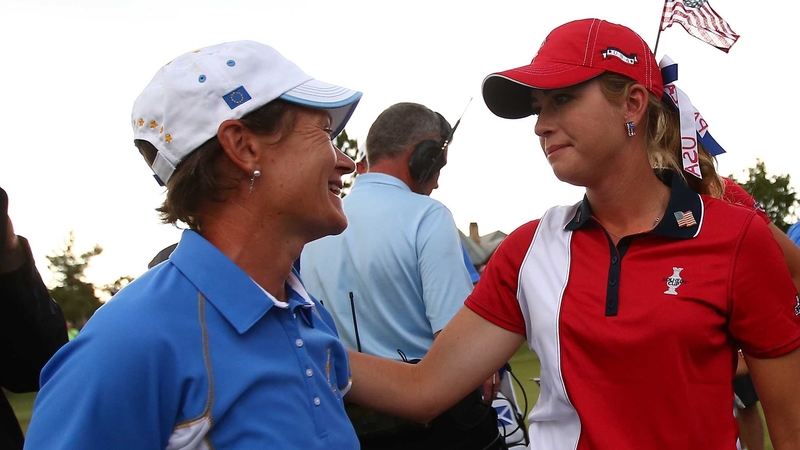 Paula Creamer of the United States (right) congratulates Catriona Matthew of Scotland (left)