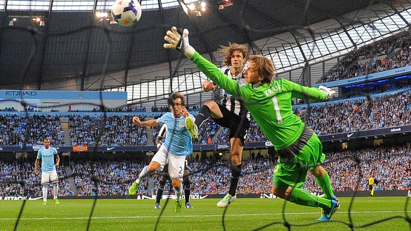 David Silva heads home the game's opening goal