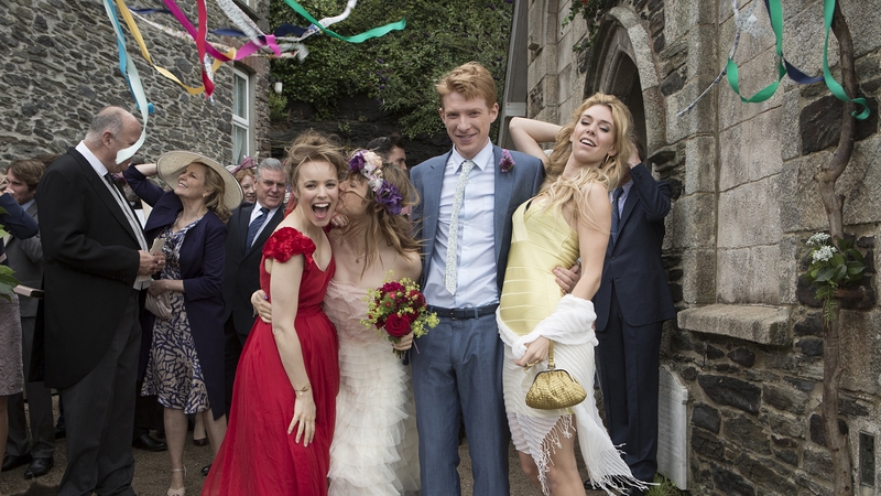 Domhnall Gleeson tries on the Hugh Grant crown for size