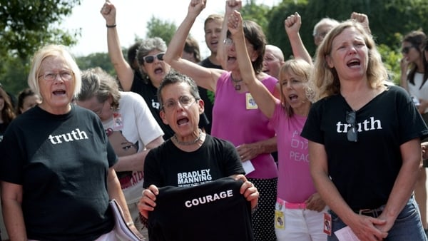 Supporters of Bradley Manning react after attending his sentencing hearing