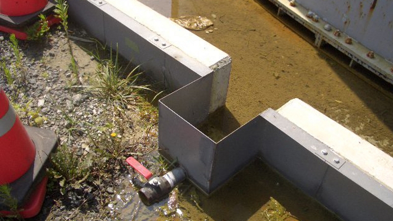 Leaked radioactive water remains near the tank at the Fukushima Daiichi Nuclear Power Plant