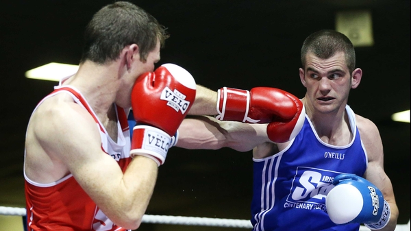 Adam Nolan (blue) will face Bernard Roe in a welterweight semi-final