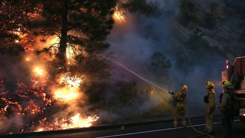 A firefighting force of around 3,700 personnel is tackling the sprawling blaze