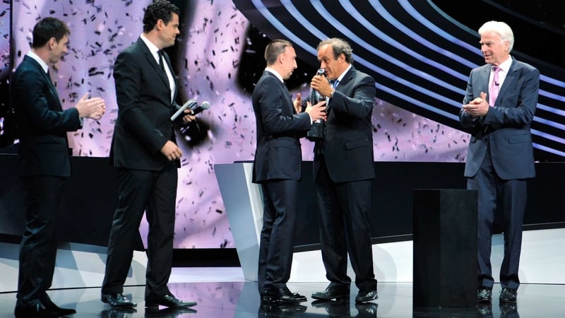 Franck Ribery was presented his award by UEFA president Michel Platini