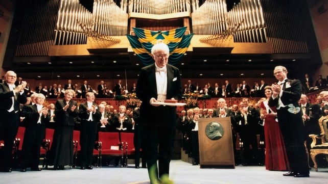 Seamus Heaney with the Nobel Prize for Literature he received from Sweden's King Carl Gustav XVI in 1995